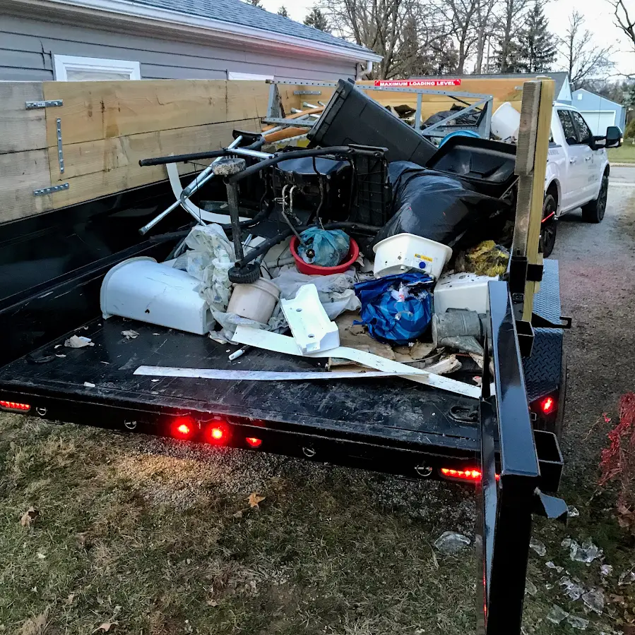 Roll-off dumpster delivered to a residential driveway in Palatka